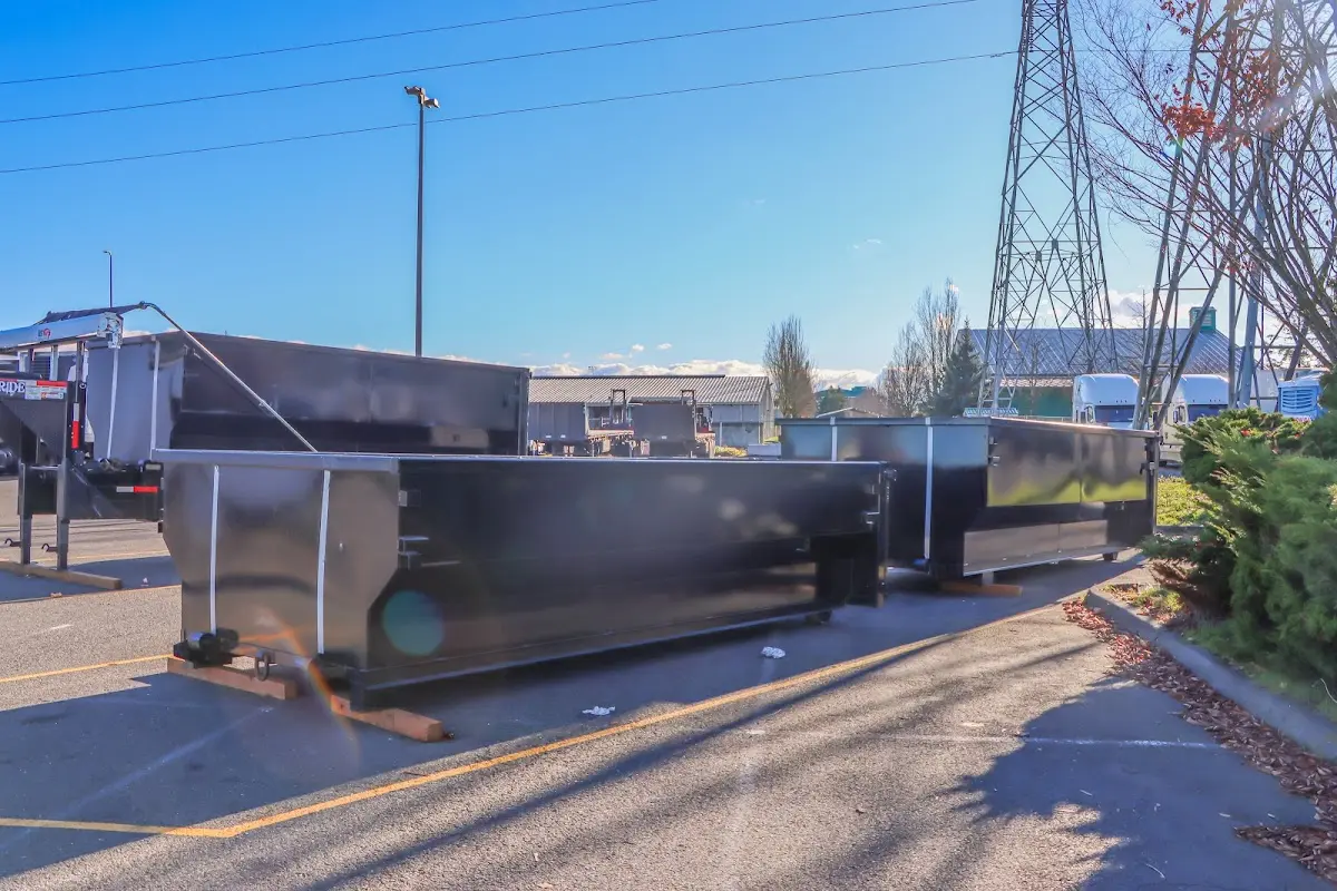 Roll-off dumpster ready for waste disposal at job site for 15 Yard Dumpster Rental in Asbury Lake